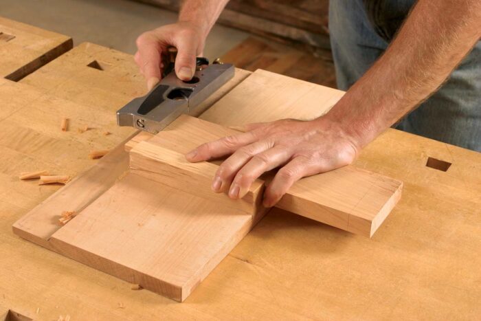 When trimming relatively narrow tenons, Gochnour finds a bench-hook jig makes the process easier.