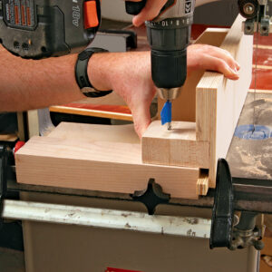 drill through the hinge block