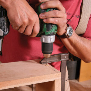 Pilot hole first. With the workpieces aligned and clamped, drill through the top board and into the bottom one with a bit sized to the root diameter of the screw.