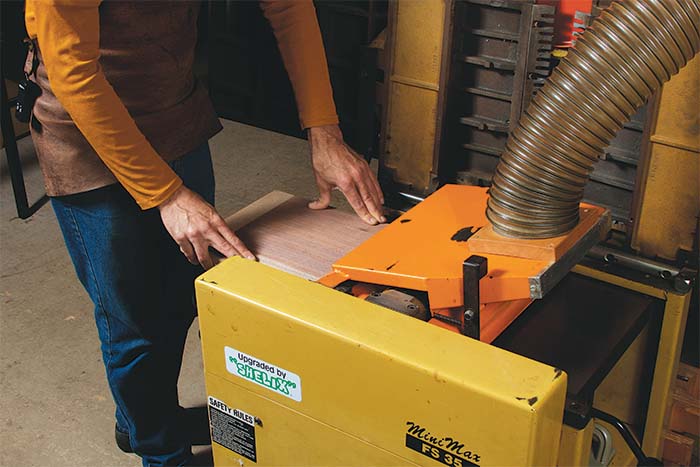 Send the veneer through the planer on top of an MDF platen