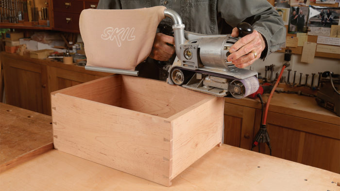 belt sander on a drawer