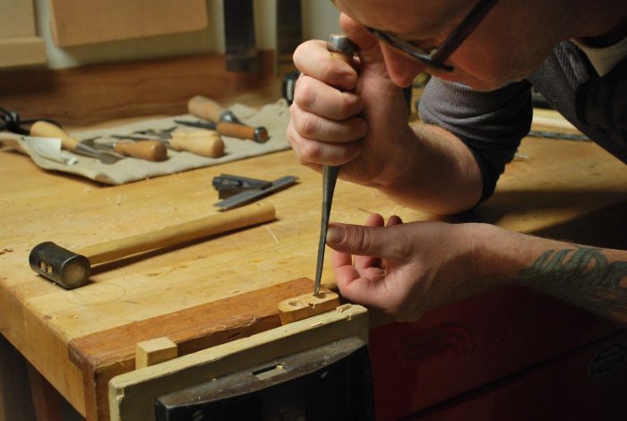 narrow chisel to get the rest of the broken dowel out