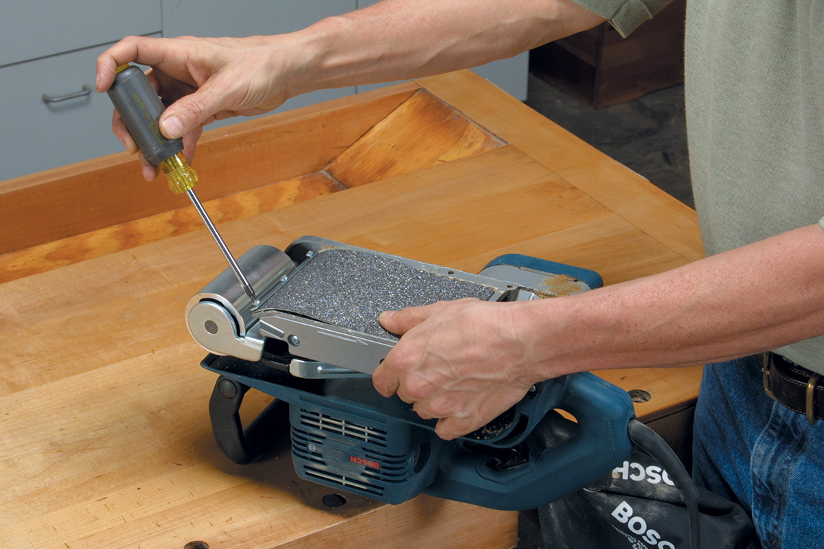 improve the performance of a belt sander