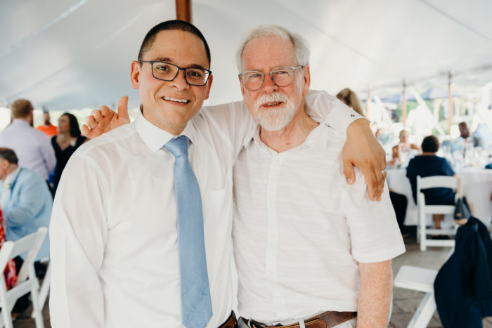 Phil and Freddy Roman smiling together