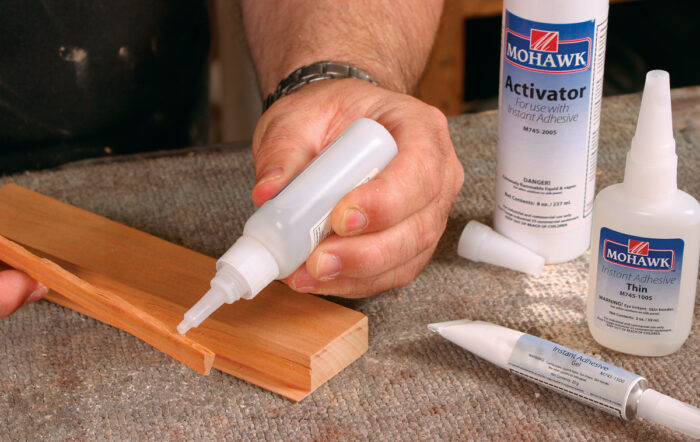 Applying Cyanoacrylate glue to wood piece