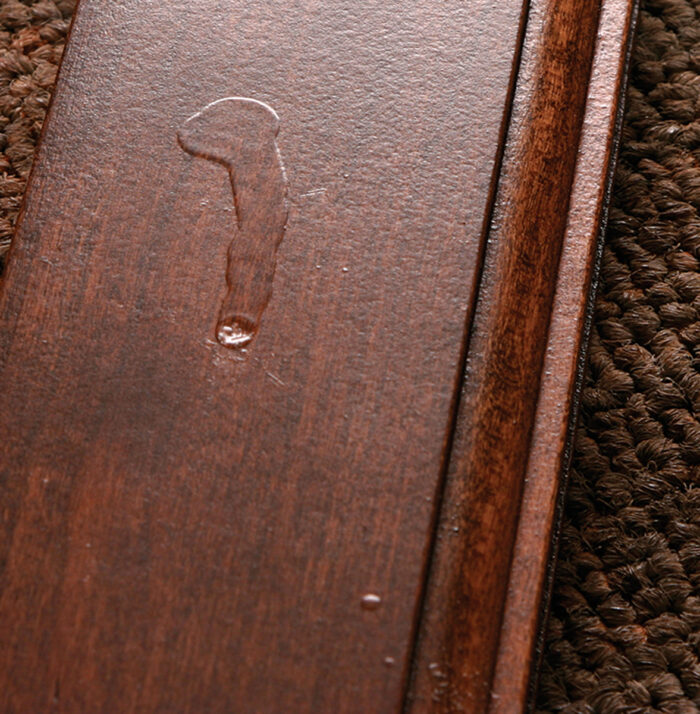 Dripped finish on wood surface