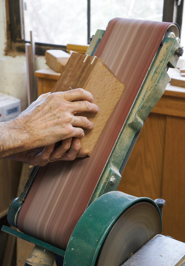 triangular keys can be quickly sanded flush to the surrounding sides with belt sander