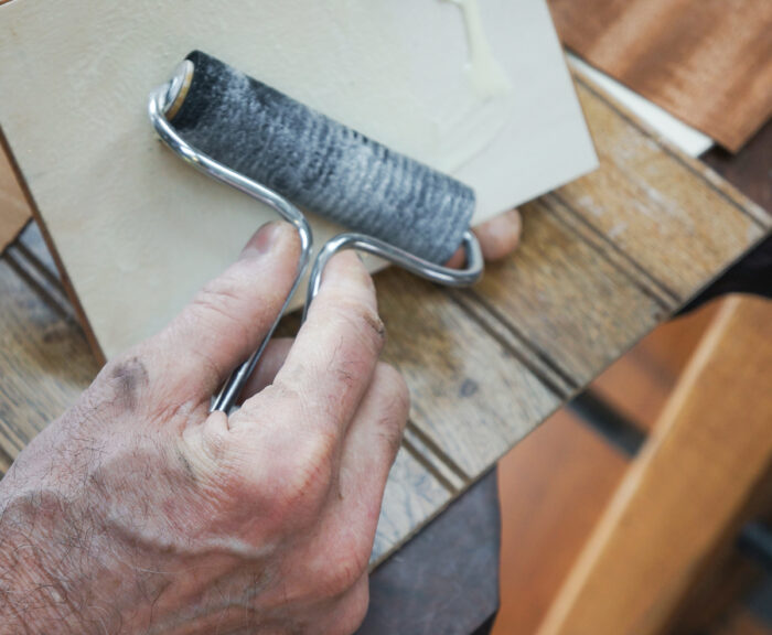 Spread glue on a box panel