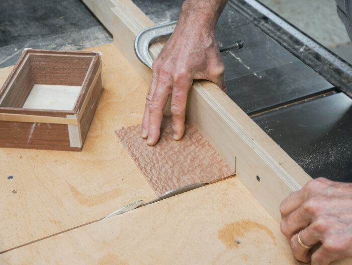 Cutting veneer panel with crosscut sled