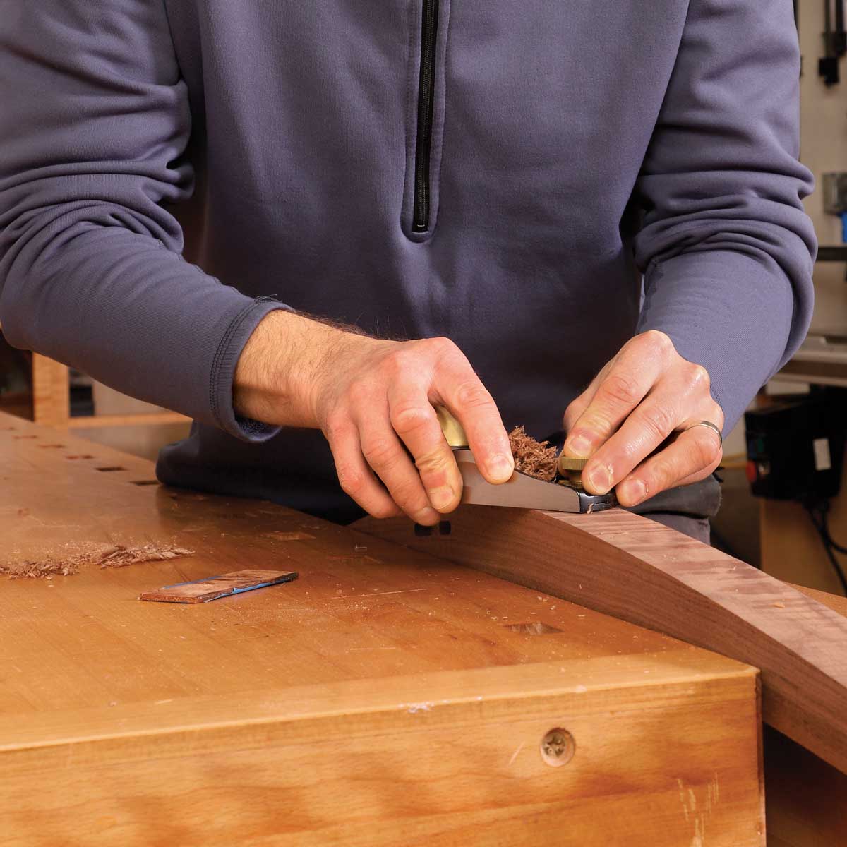 Block plane fairs a curve. To smooth a convex curve, continuously adjust the angle of the sole so the area just ahead of the blade rides the workpiece during the whole cut. Some very shallow concave curves can also be smoothed with the block plane, provided it is held askew.