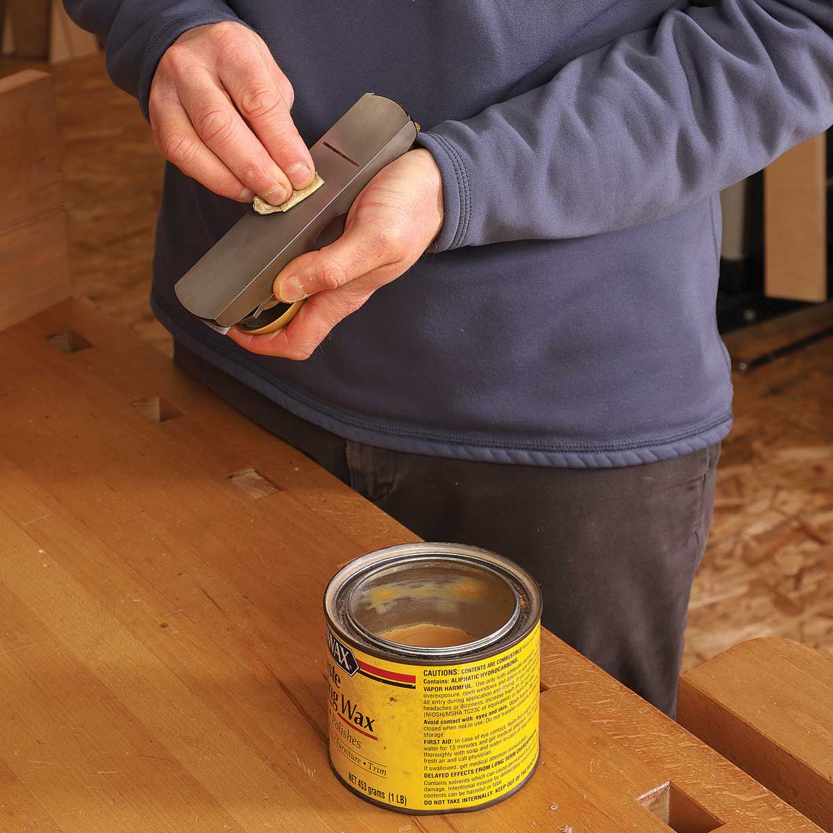 Wax up. Unless the surface he’s smoothing will be glued (like some miters), Korsak waxes the sole of his block plane before planing end grain to minimize friction. 