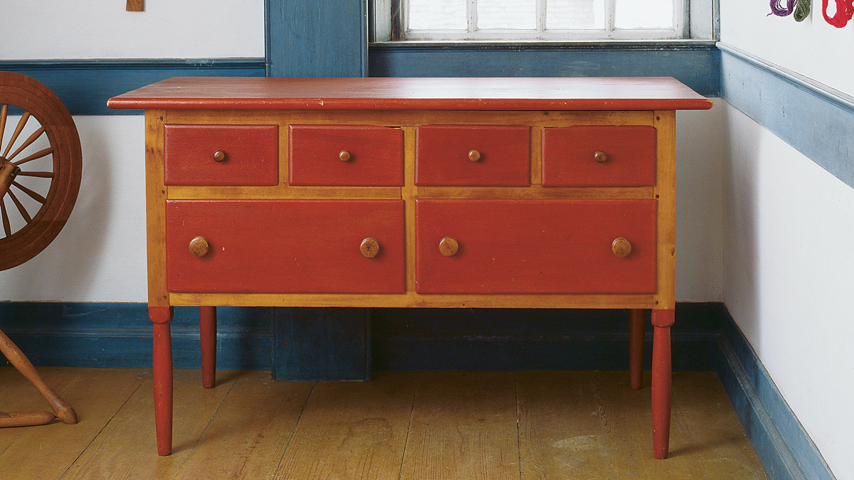 Building on a Shaker foundation. Early in his career, Hack closely studied the forms of Shaker furniture, like the chest above, attracted to their directness, simplicity, and clarity. His own pieces, like the cherry and maple table at left, clearly reflect their Shaker roots but have a crispness and lightness of their own. 