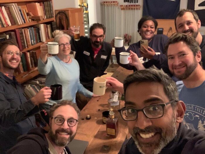 Woodworking students celebrating together with some bourbon whiskey.