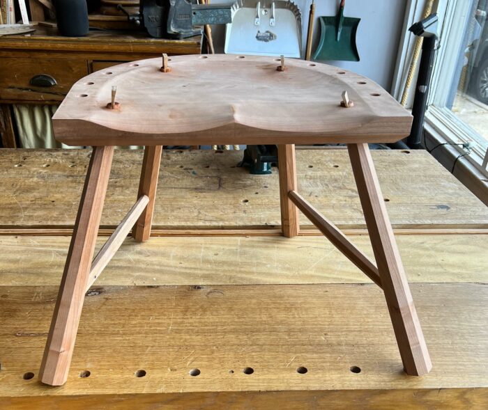 Legs and stretchers glued up on a stick chair.