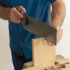 Frank Strazza saws his dovetails