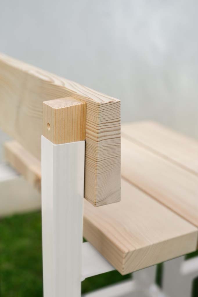 A close up of the back of a chair showing lovely woodgrain. 