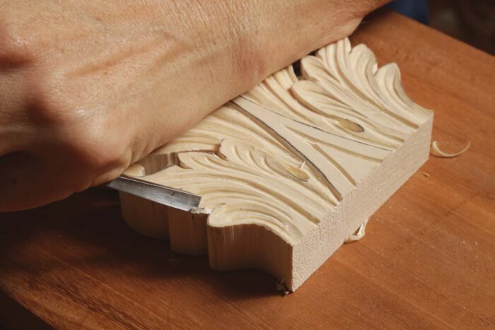 Mary carves the edges adding a wrinkle